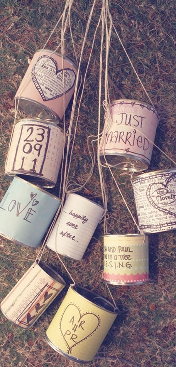 The traditional cans that trail the getaway car- adorable idea for a vintage wedding
