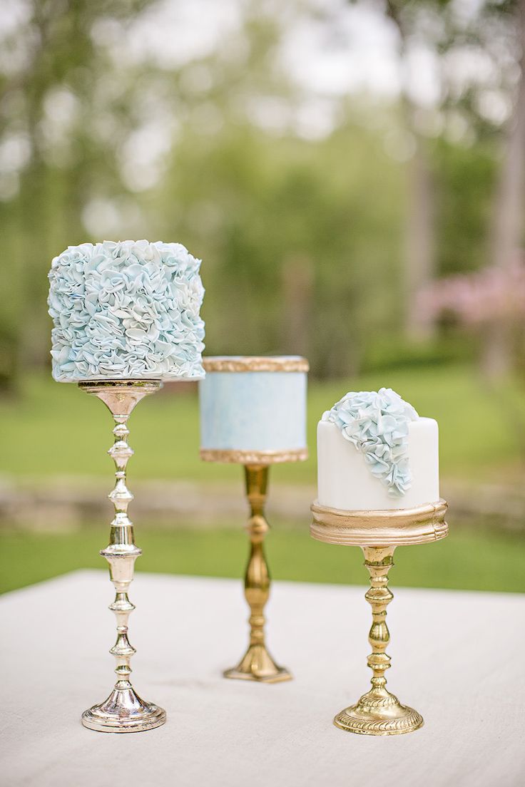 Trio of delicate dusty blue mini wedding cakes