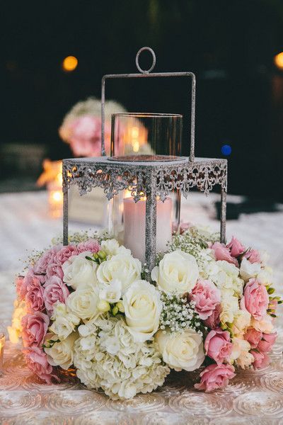 Ultra lush roses, hydrangeas, & baby’s breath wedding centerpiece