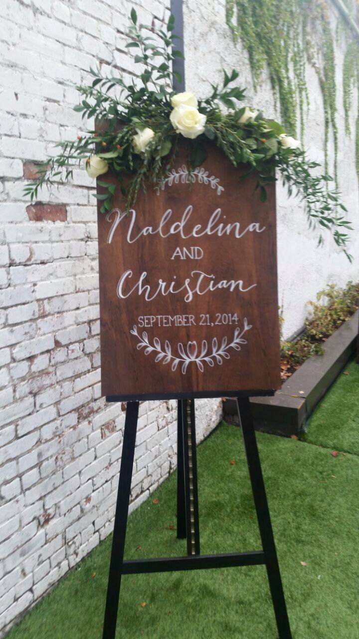 Wedding welcome custom sign on stained plywood
