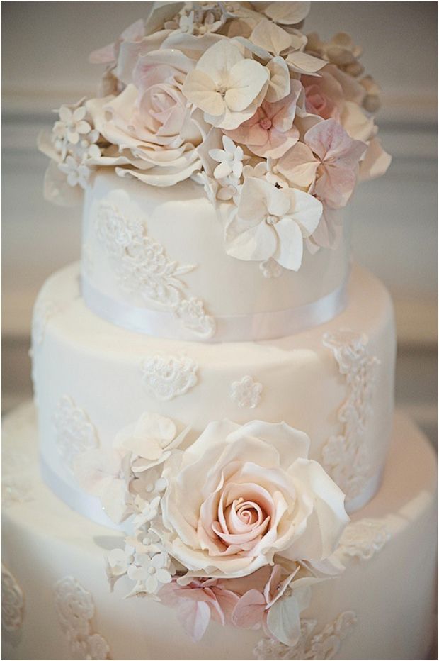White Lace cake for wedding with pink sugar roses and hydrangeas