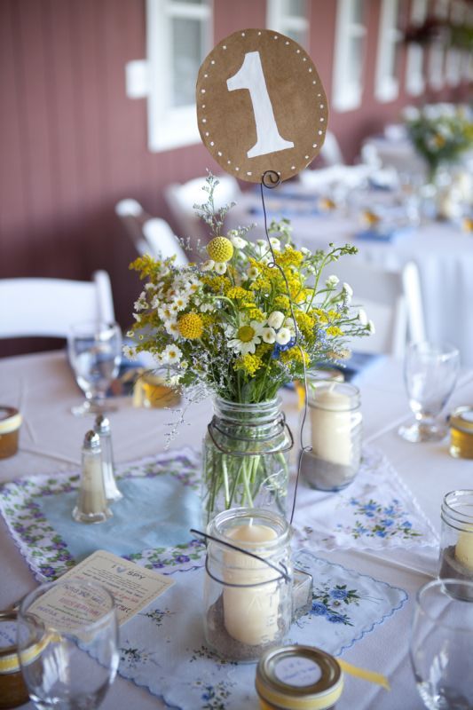 Wild flowers in mason jar and vintage napkins