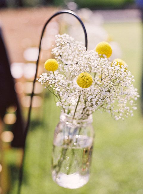 baby's breath and billy balls wedding aisle
