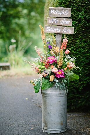 beautiful milk churn flower arrangements for the church with cute Happily Ever After Starts