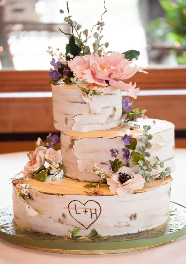 birch wedding cake with wildflowers and violets