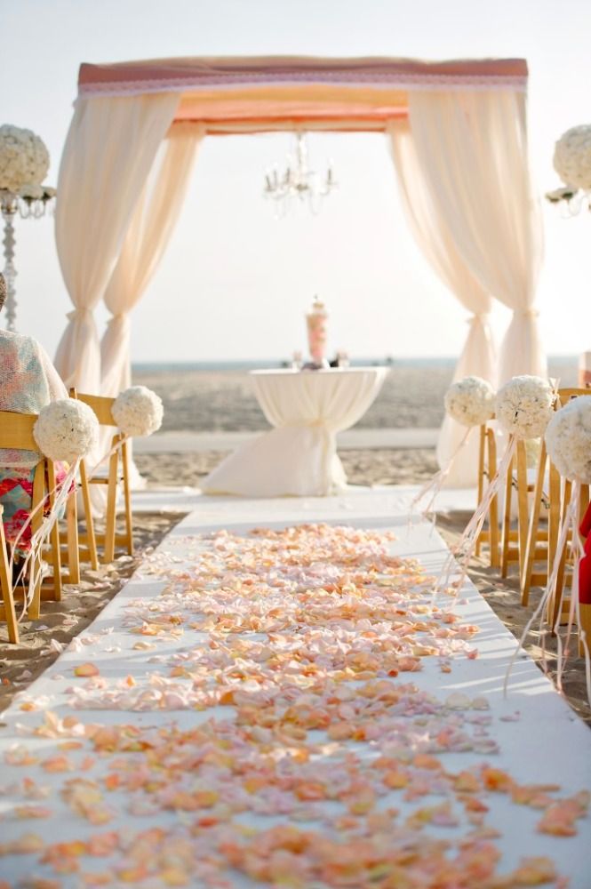 blush flower wedding aisle and blush beach wedding arch