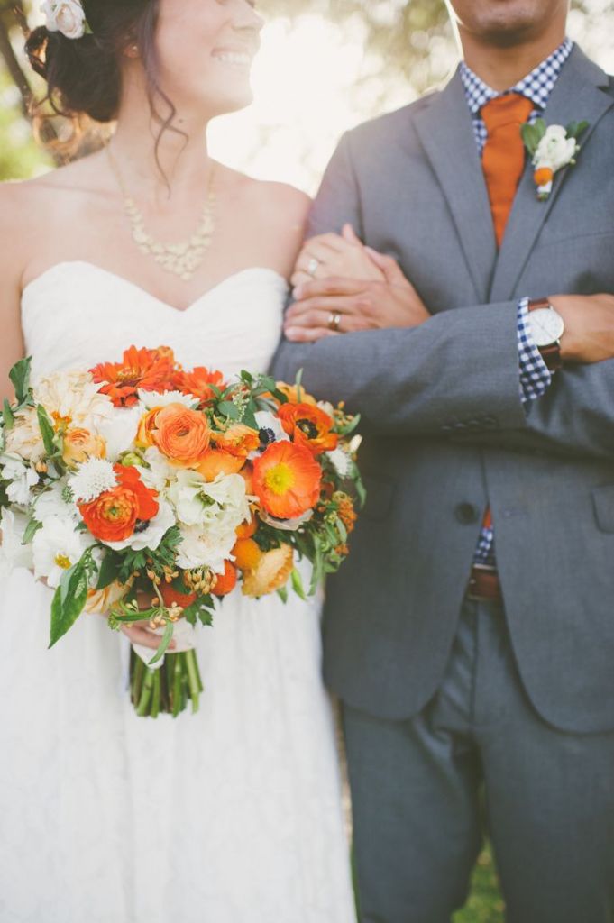 coral and white fall wedding bouquet for bold autumn backyard wedding