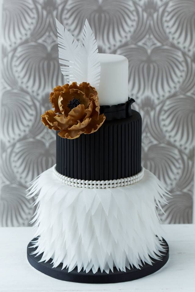 cute white and black feather wedding dress with gold flower