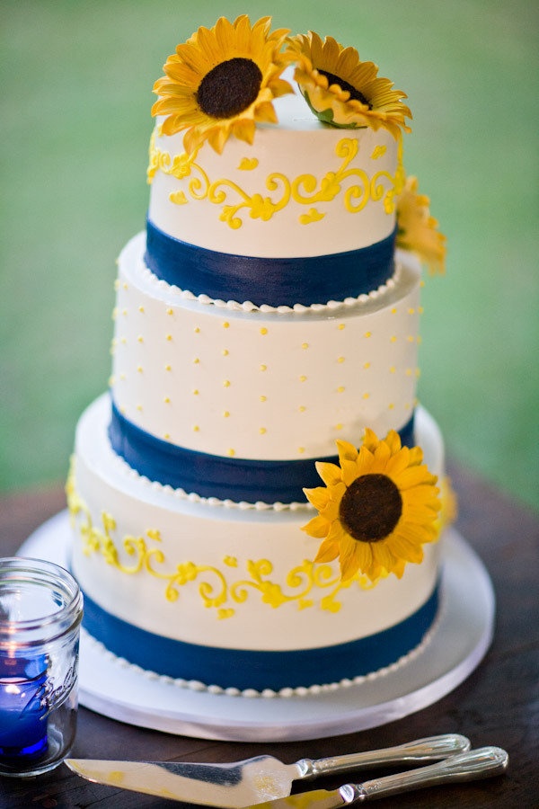 dark blue and yellow sunflower wedding cakes