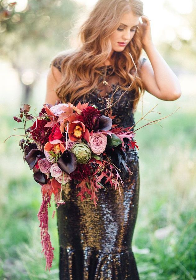 fall wedding bouquet and black sequined wedding dress
