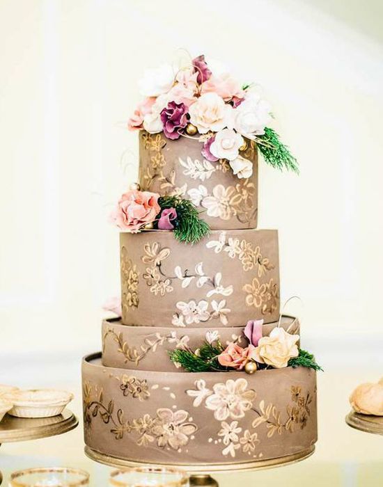 gold printed fall wedding cake with sugar pink purple flowers