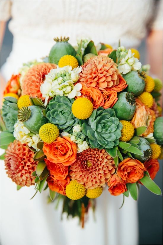 green succulents yellow billy balls and coral roses wedding bouquet
