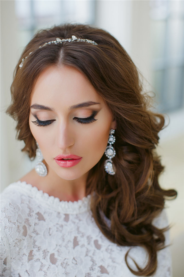 half up wavy long wedding hairstyle with pearl headpiece