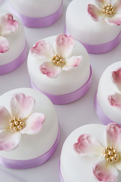 light purple crystallised apple blossom mini wedding cakes