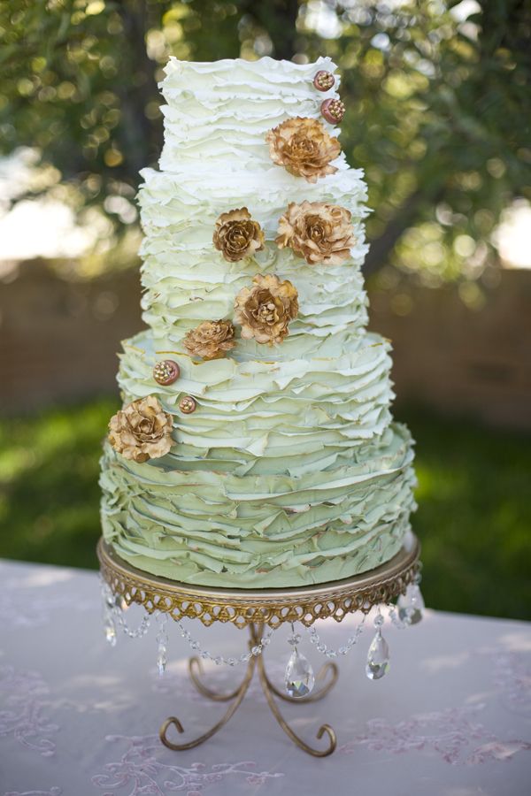 mint green and copper wedding cake with gold sugar flowers