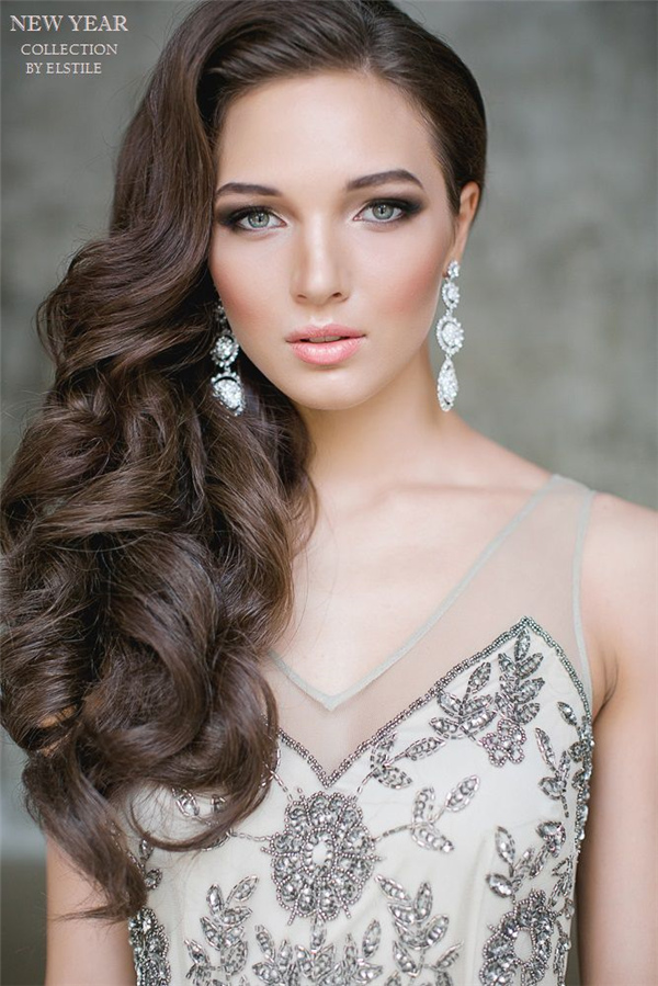 one side half up wavy wedding hairstyle for long hair