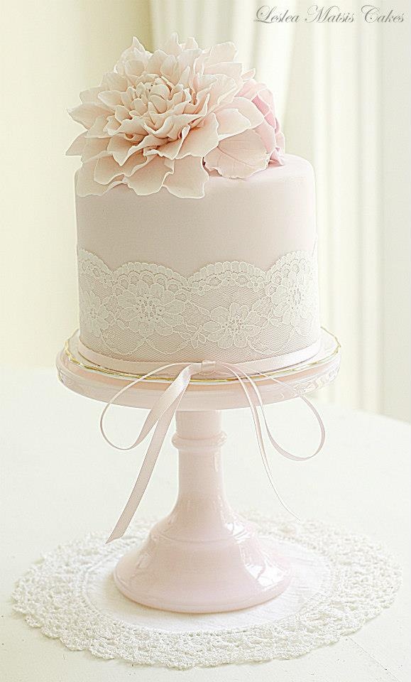 pastel pink small lace wedding cake with sugar flower topper