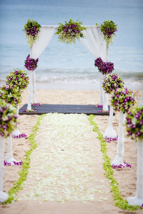 40 Romantic Wedding Aisle Petals Decor Ideas 13 purple and green beach wedding arch aisle ideas
