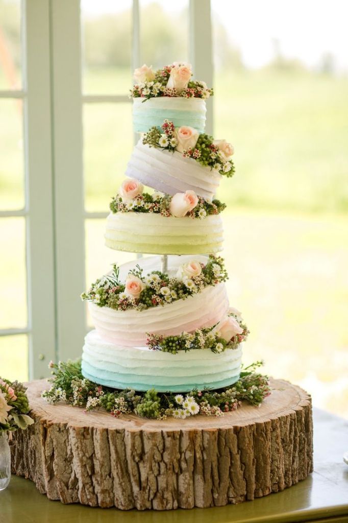rustic pastel buttercream wedding cakes with wildflowers and roses