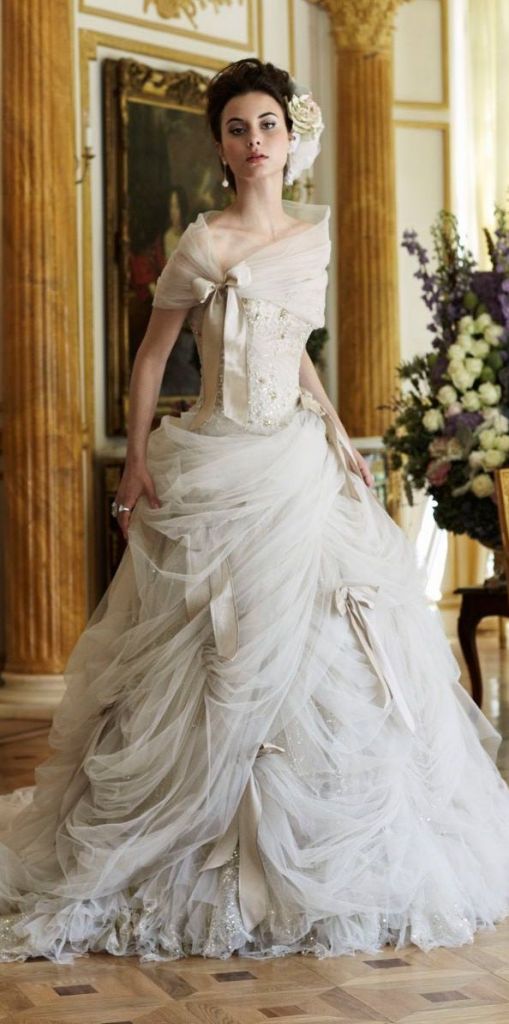shawl and draping dress with bow steampunk wedding dress