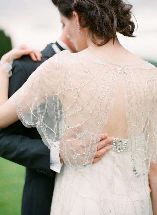 simple wedding gown with sheer beaded capelet