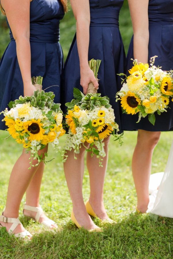 sunflower wedding bouquets and navy bridesmaid dresses