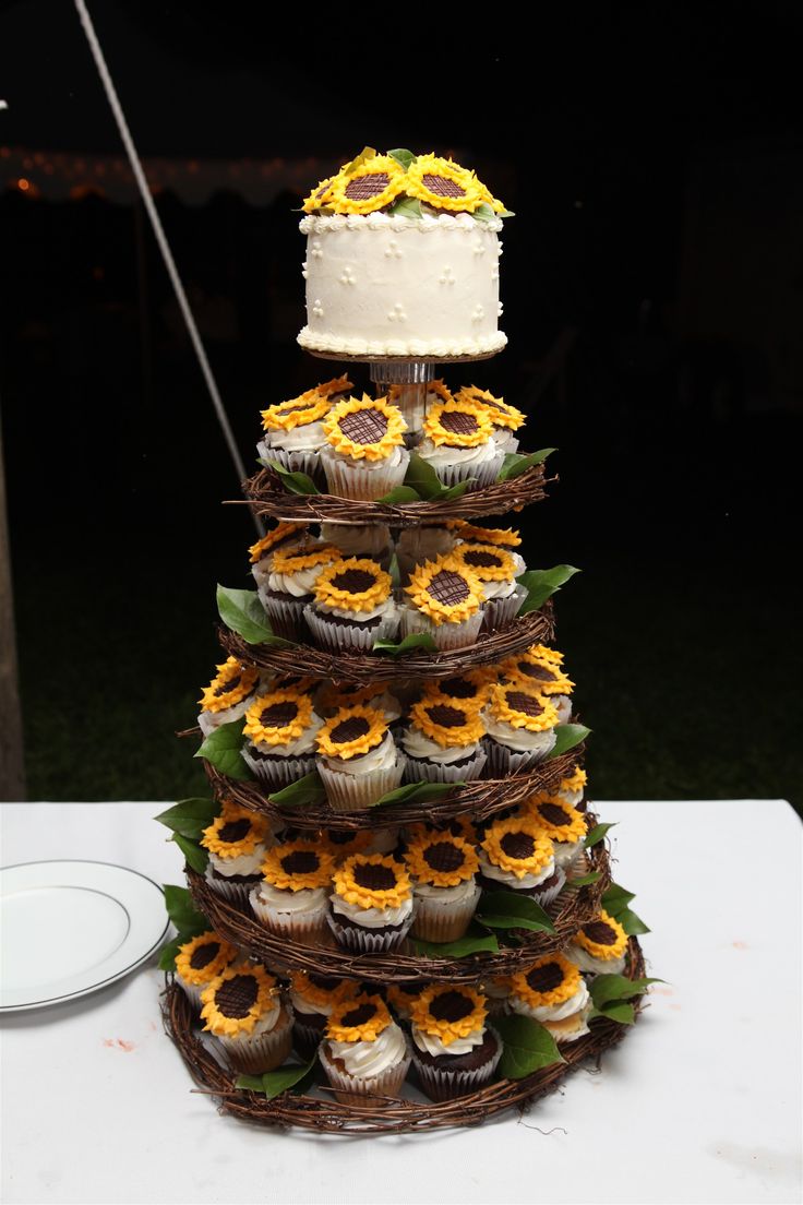 sunflowers wedding cake and cupcakes