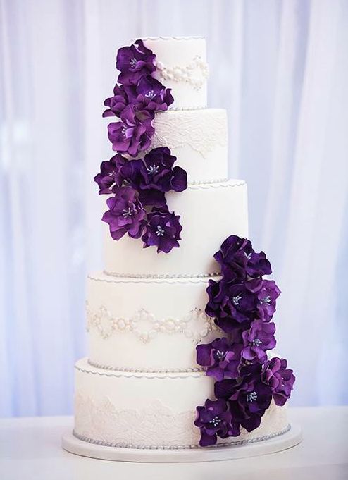 vintage wedding cake with plum flowers