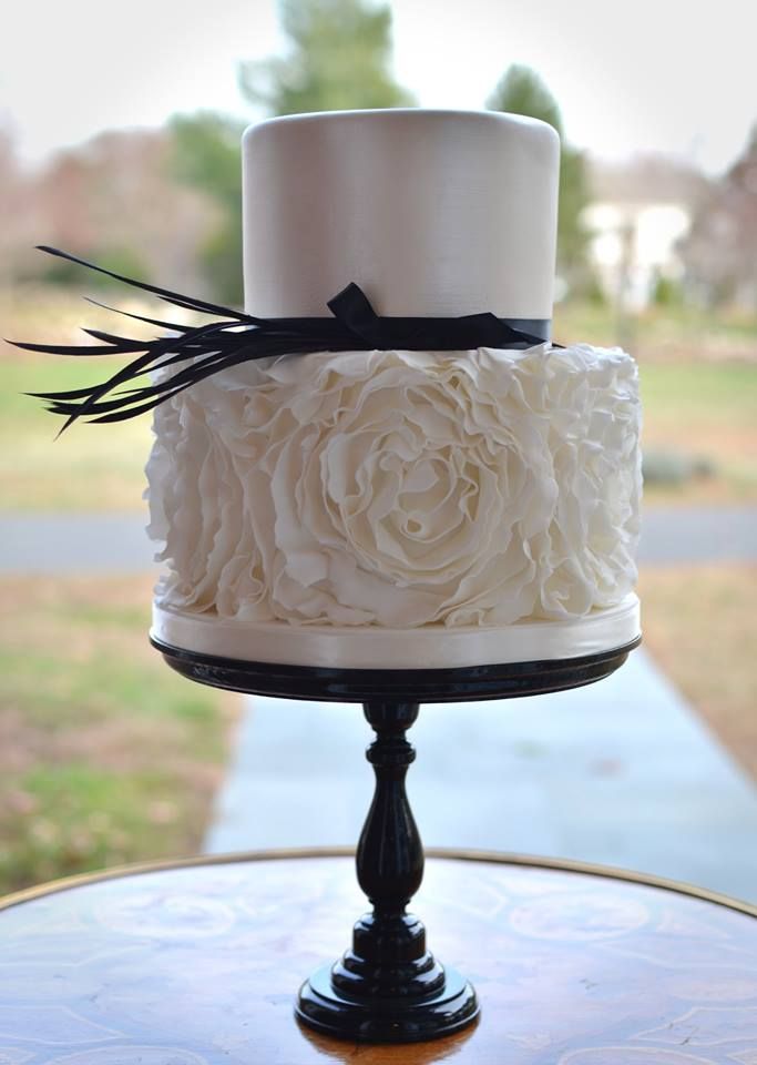 white and black wedding cake inspired by vera wang short wedding dress