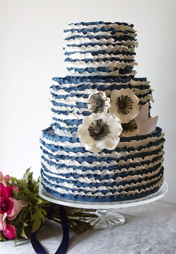 white and blue anemone wedding cake with ruffles