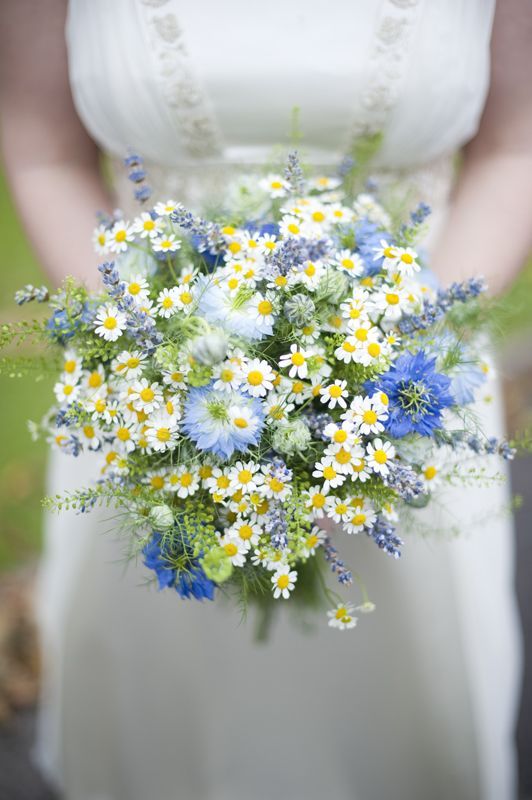white and blue wildflowers wedding bouquets