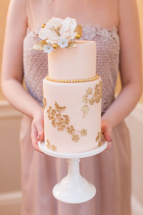 Blush wedding cake with gold details