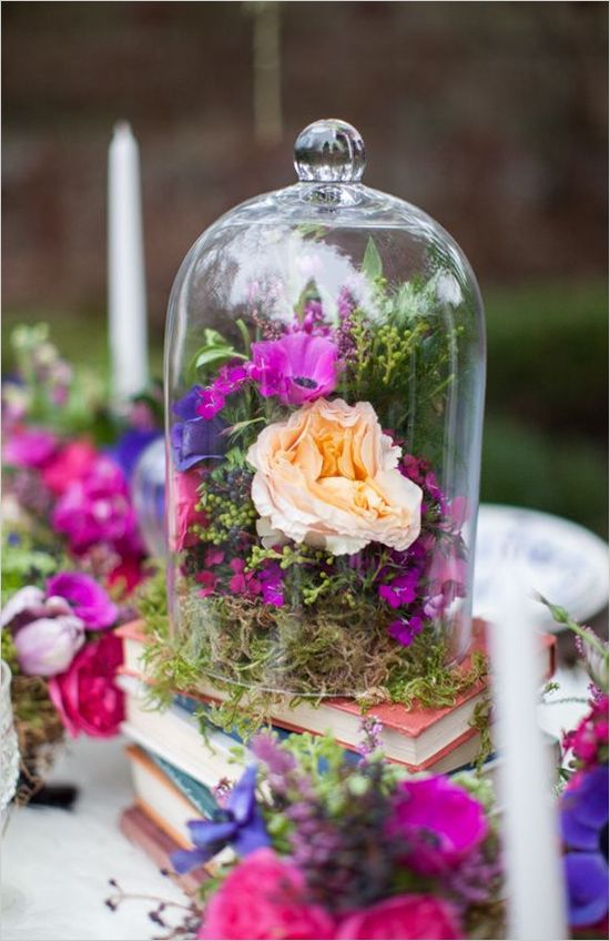 Bright and earthy bohemian book wedding reception table decor