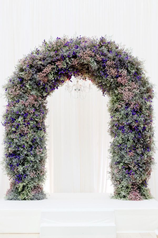 Dreamy pink and purple flower wedding arch