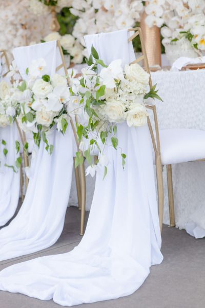 Elegant white chairs for wedding