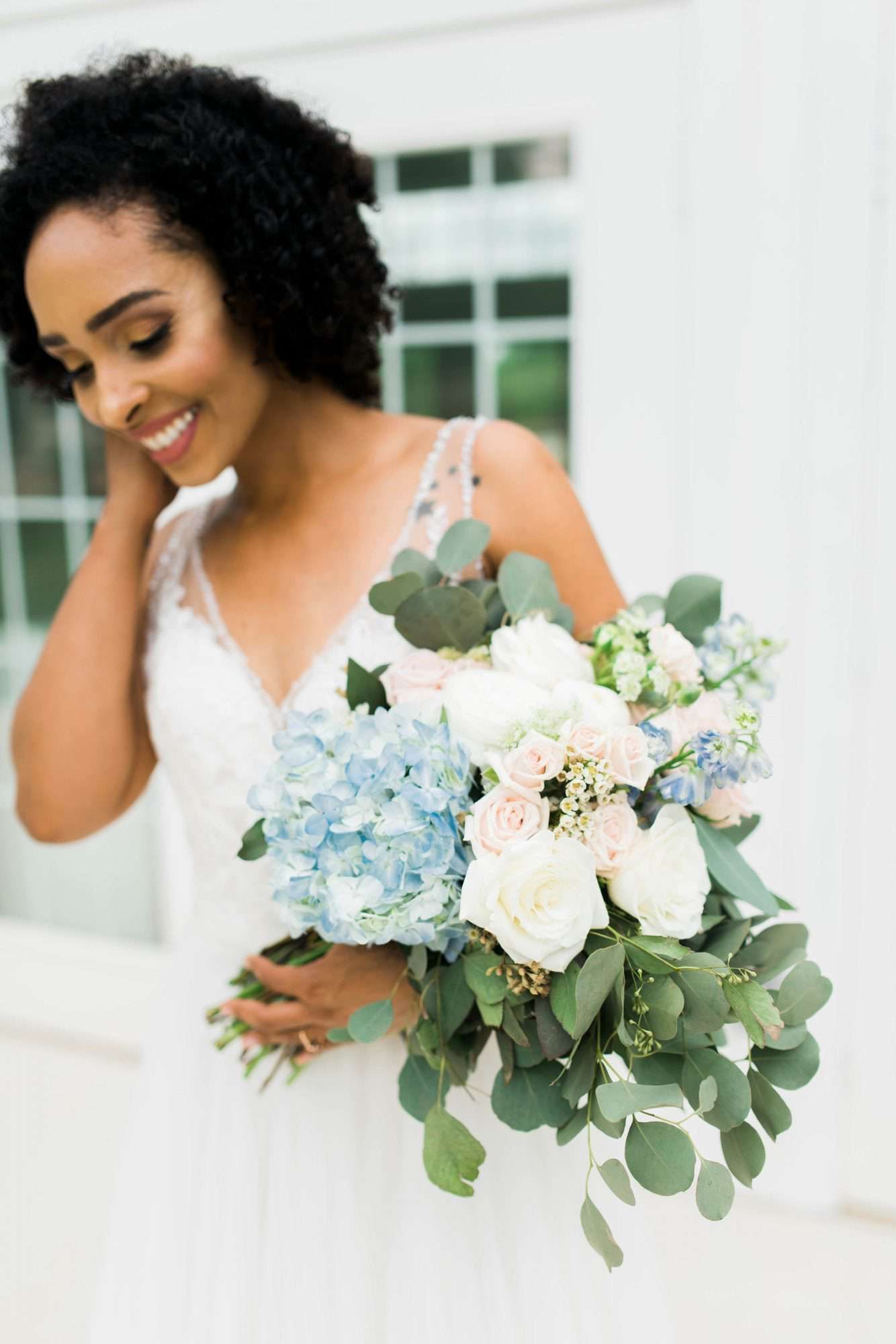 Light blue hydrangea and eucalyptus wedding bouquet