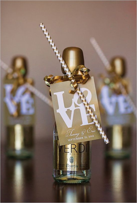 Mini champagne bottles with sipping straws and cute love labels
