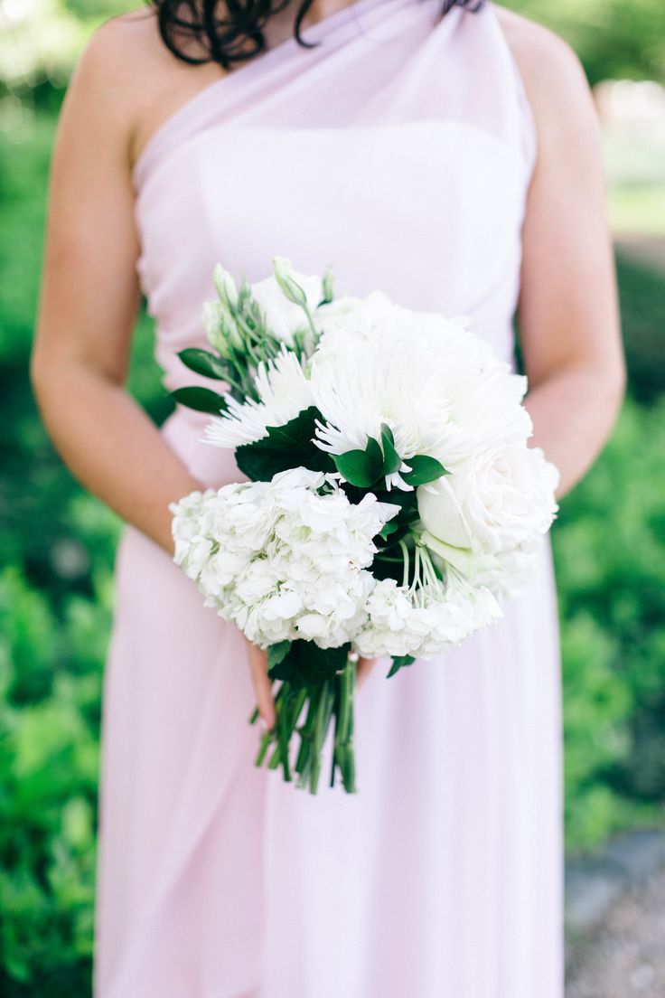 Monochromatic white blooms bridesmaid bouquet