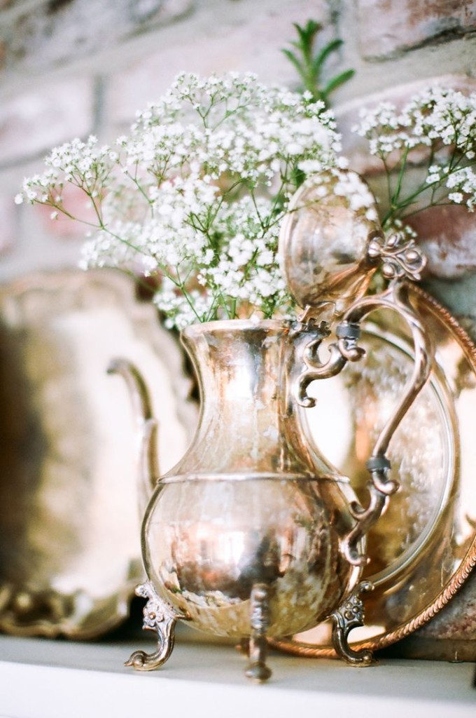 Puffs of Baby's Breath in Vintage Containers