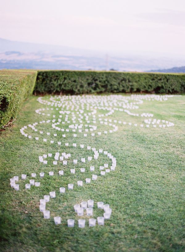 40 Romantic and Timeless Green Wedding Color Ideas 37 Swirling Votives On The Lawn Ceremony Decor