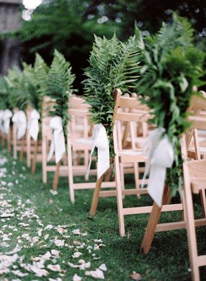 Woodsy fern aisle decor