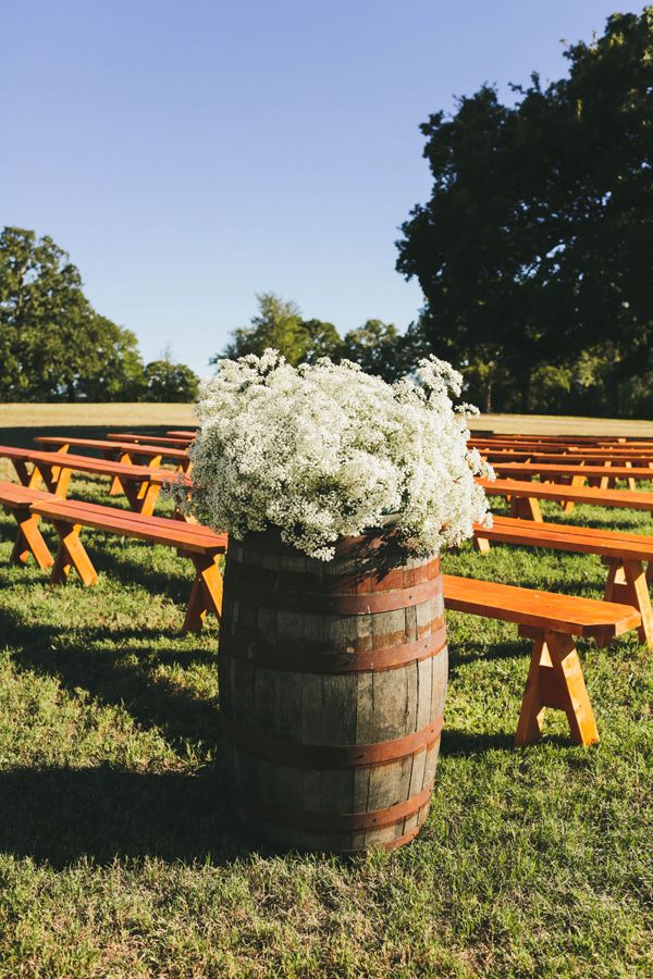 babys breath would be a perfect way to get that wow on our wine barrels