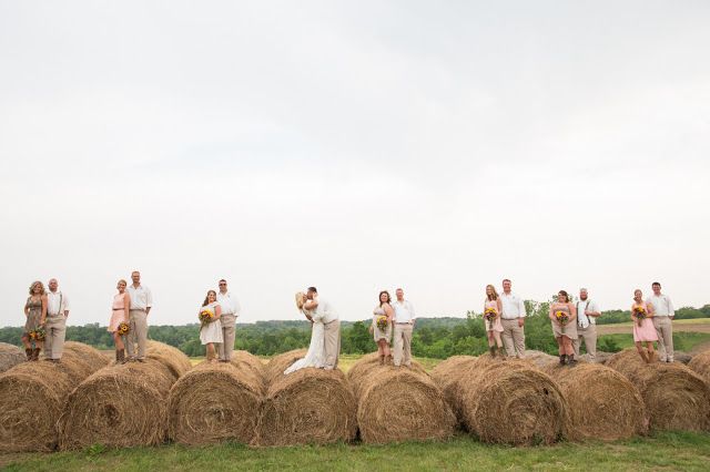 beautiful blush farm wedding + haybales