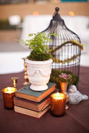 black birdcage and books wedding centerpiece