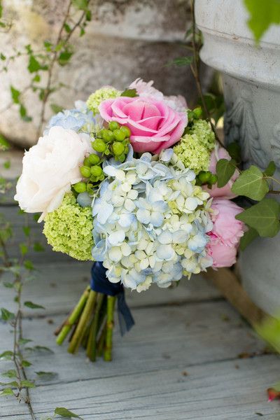 blue hydrangea wedding bouquet with pink roses