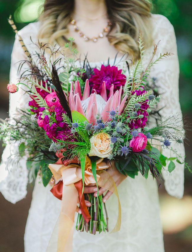 bohemian wedding bouquet of protea, thistle and dahlias