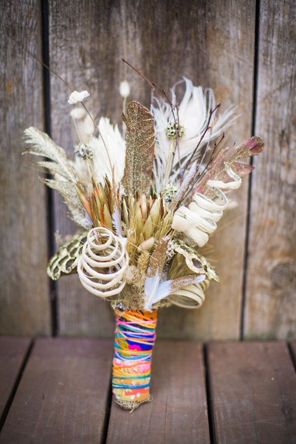 bohemian wedding bouquet with colorful wrapping