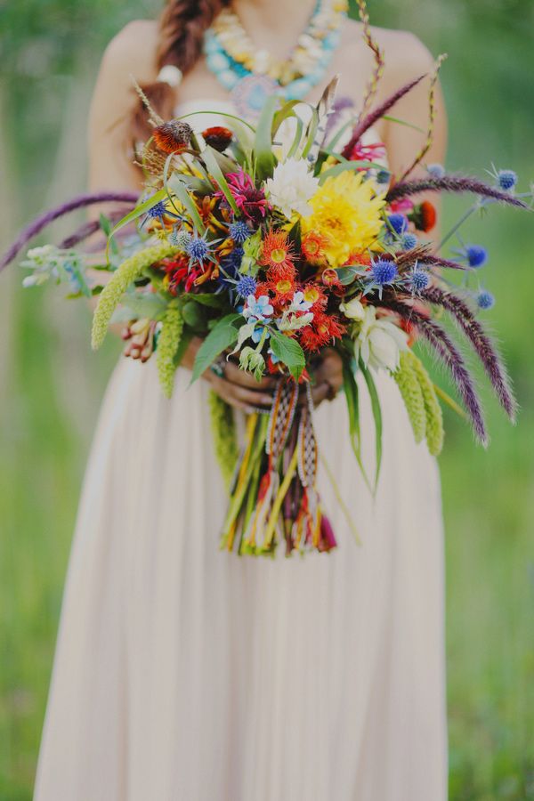 bridal bouquet with blue thistle, rattail status, dahlias, eucalyptus blooms