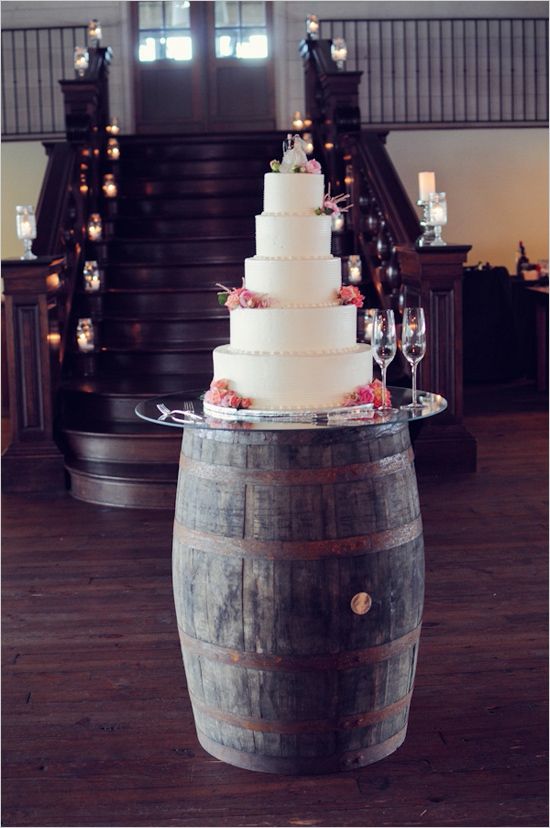 classic wedding cake on a wine barrel cake stand