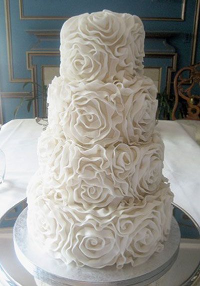 floral ruffles all white wedding cake